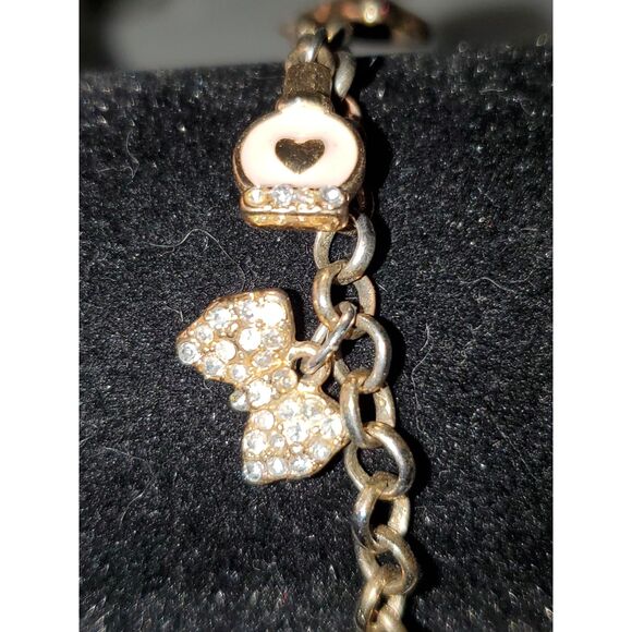 A Guess Women's Charm Bracelet Gold Tone Chain Lipstick Rhinestone - Picture 3 of 11